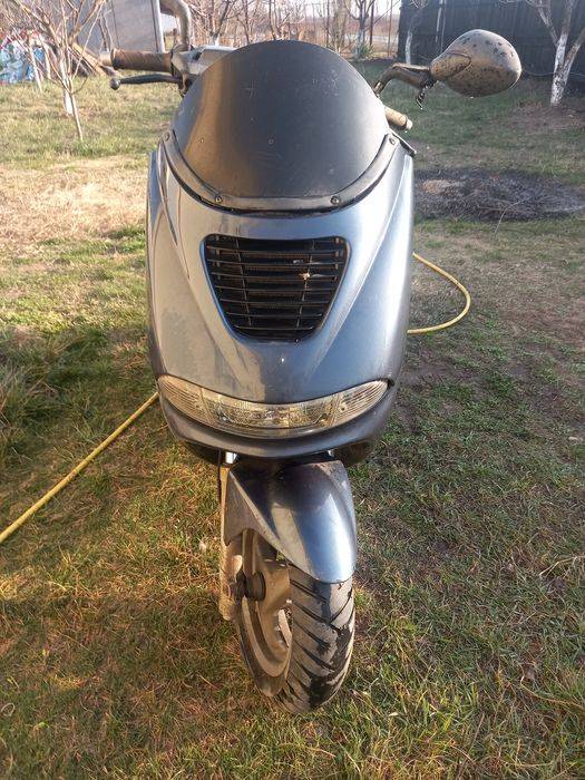 Scuter Peugeot. ..