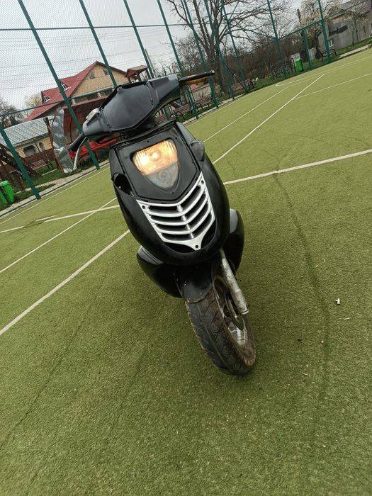 vând scuter Aprilia 125cc (fac și schimb cu cros și atv 125 cc)