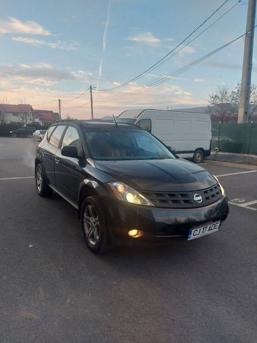 Schimb nissan murano cu scuter electric model soco