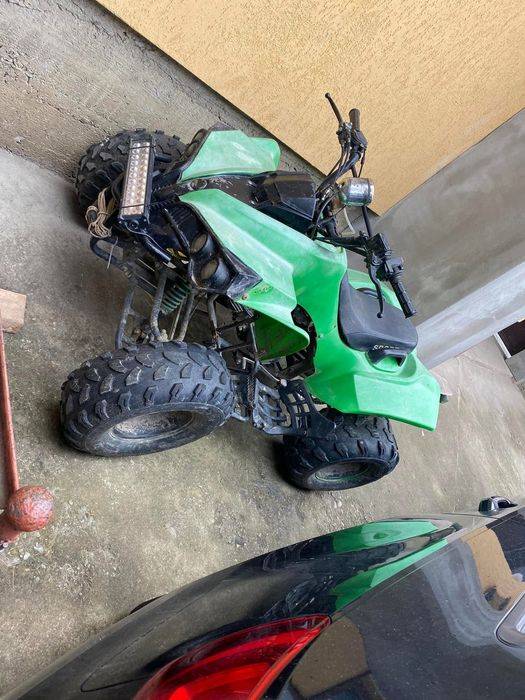 Vând atv 125 în 4 t