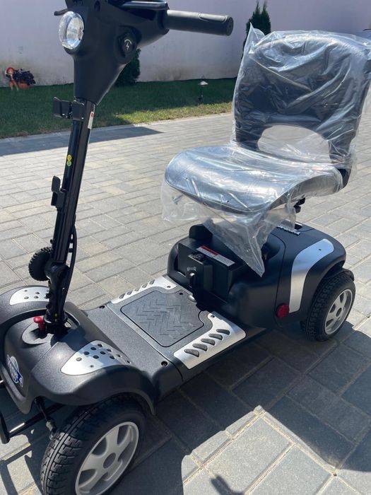 Vand scooter electric nou, pentru persoane cu dizabilitati.
