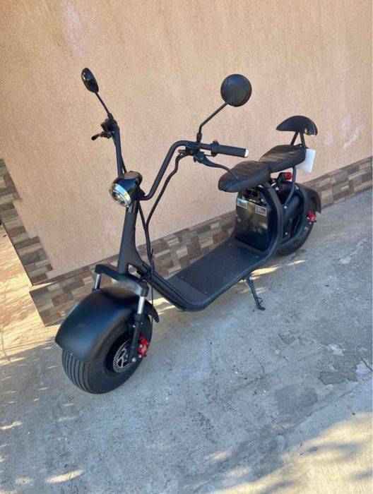 Dau scuter electric harlei e ca nou singura problema nu mai am incarca