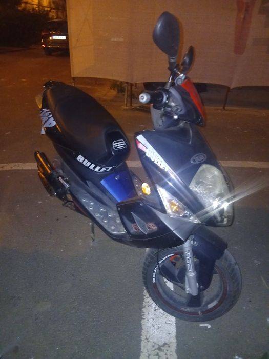 Motoscuter 49--. 2 timpi.
