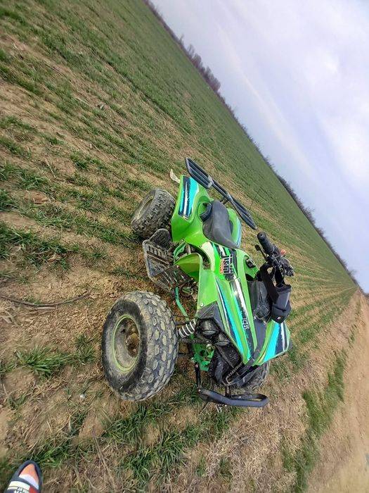 Vand atv 125cc pret €