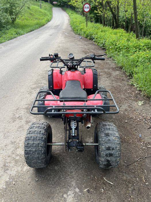 Vand atv de 125 cm is stare foarte buna 3+1  merge bine trage bine
