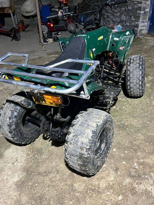 Vând  atv 125  c