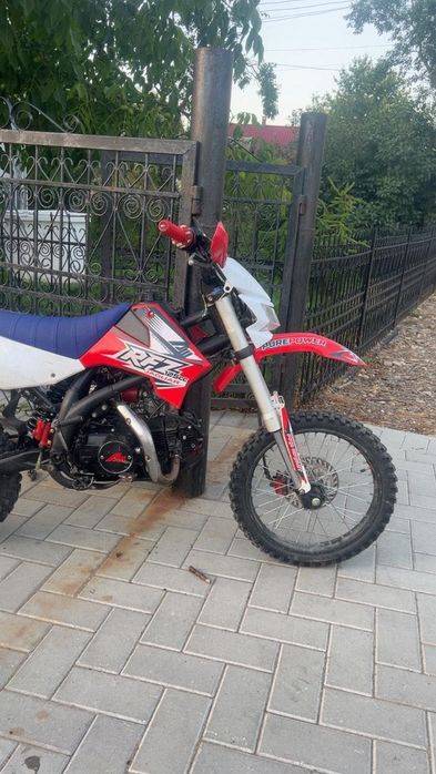 Cross RXT 125cm³