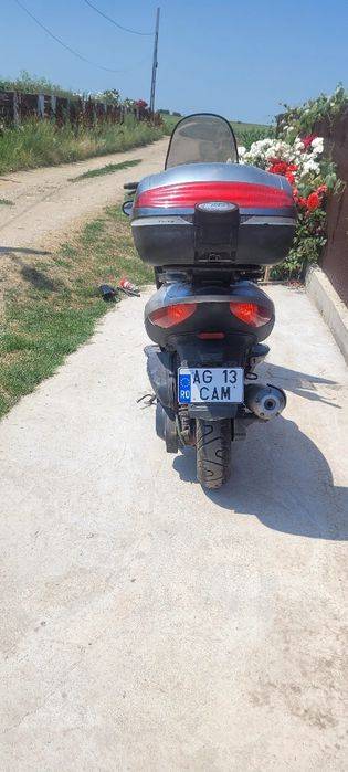 Vand sau schimb malaguti madison 250 cc