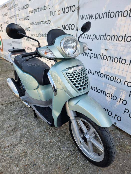 Punto Moto Vinde Scooter 125cc Aprilia scarabeo  [Honda]