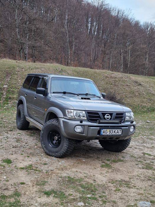 Nissan pattol y61 3.0 model USA Autoutilitara 5 locuri