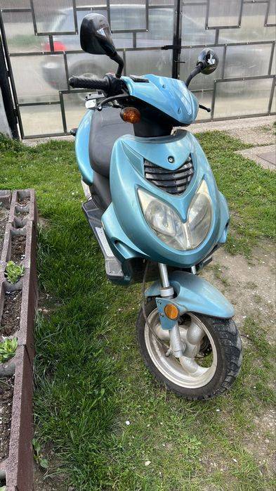 Scuter ca si nou