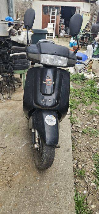 Scuter kyimco ,cu motor honda.