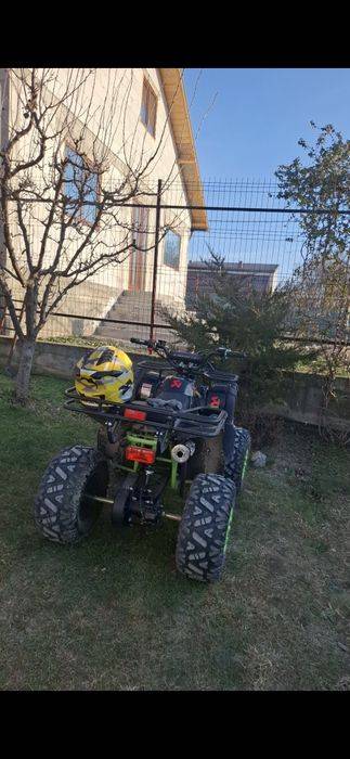 vând atv kxd 125