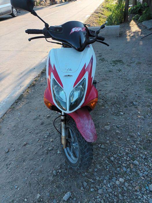 Vând scuter  honda