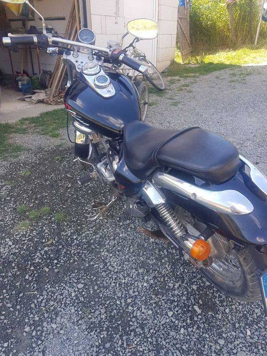 vand sau schimb motocicleta kymco zing II 125 cu ATV goes 450L