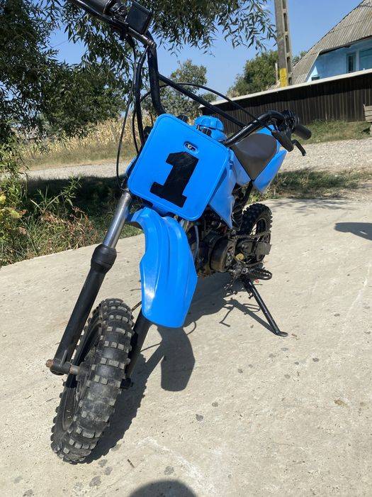 Cross 125cc in 4 timpi
