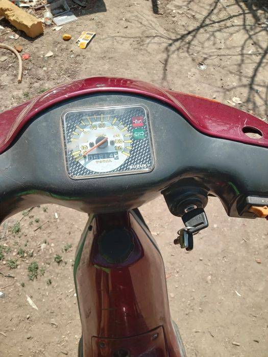 Vand scuter mini suzuki.