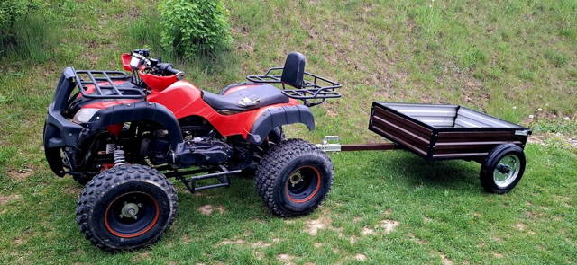 Quad 150cm³ z przyczepką.