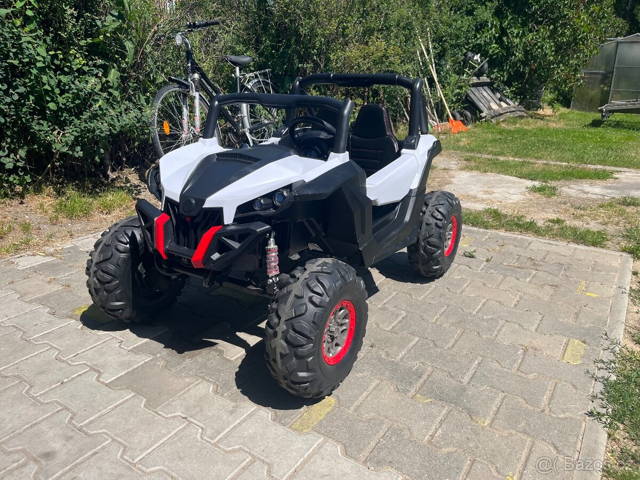 Dětská el.bugina 4x4 pro dvě děti nosnost 55 kg jako nová