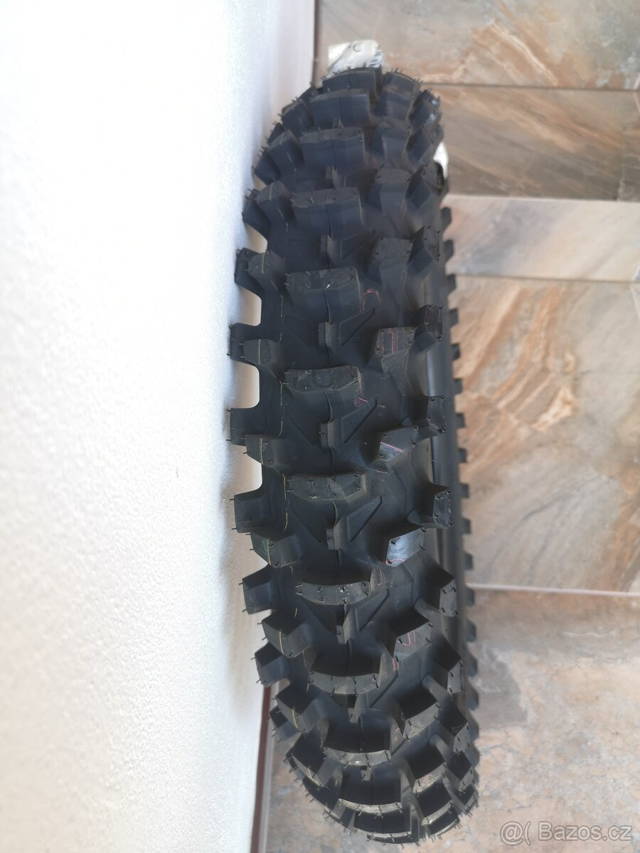 Bridgestone 100/90 R19, nepoužitý zadní drapák.