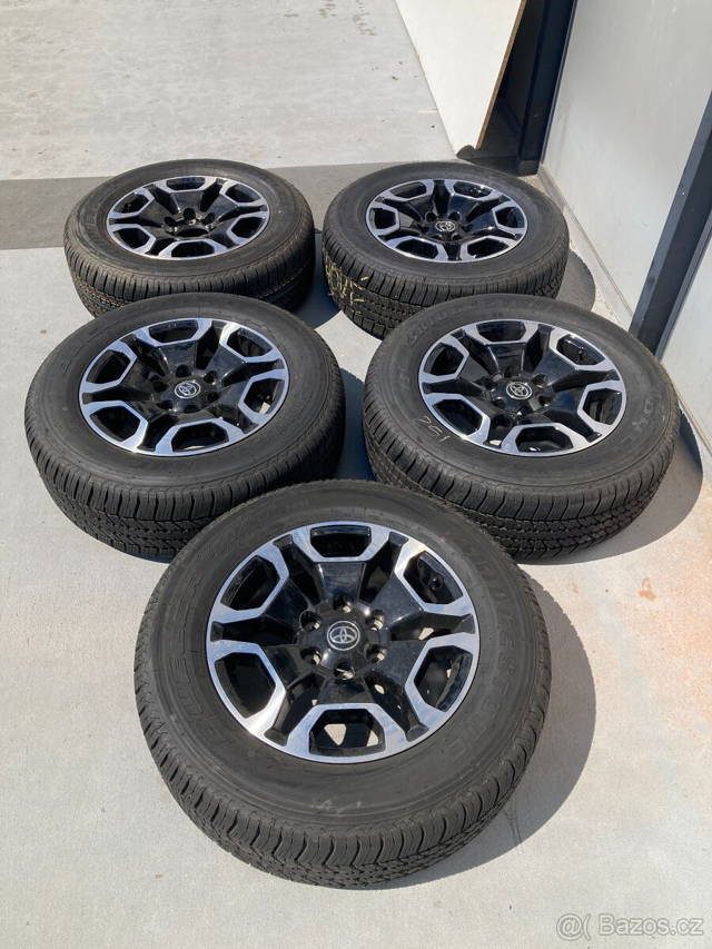 Originální sada alu disků - Toyota Hilux vč. pneu